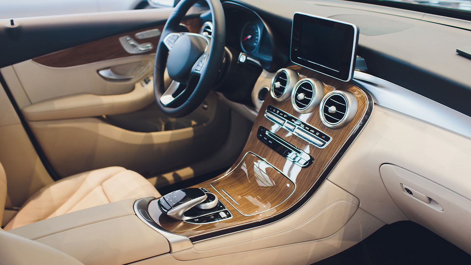 Interior of a car with leather seats.