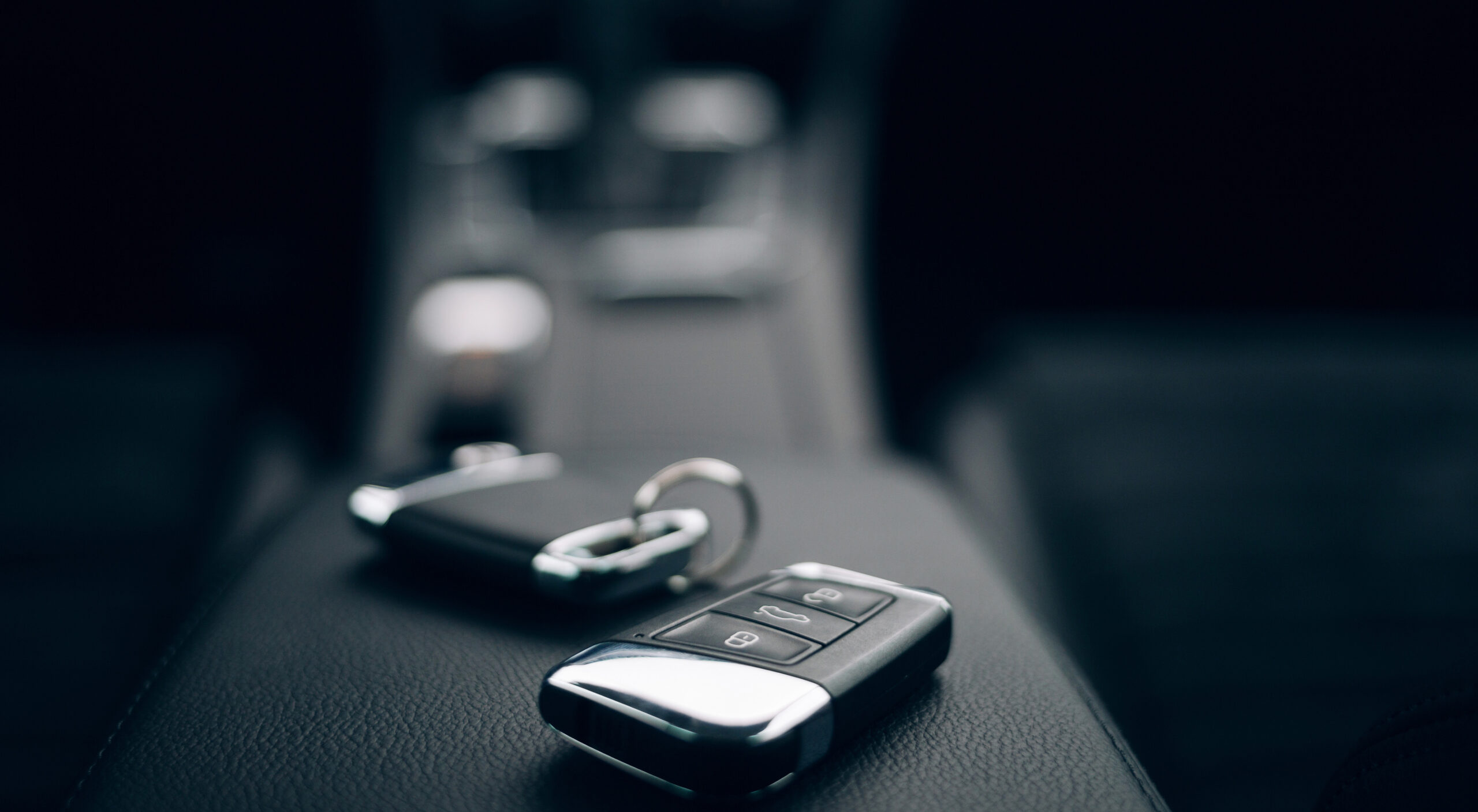 Keys on the middle arm rest of the car 