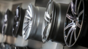 Aftermarket Rims hanging on a wall